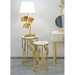 Runde metalborde – marmorlignende bordplade, bladdesign